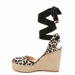 Jennifer Lopez, cheetah, print, strap around the leg, wedge heels
